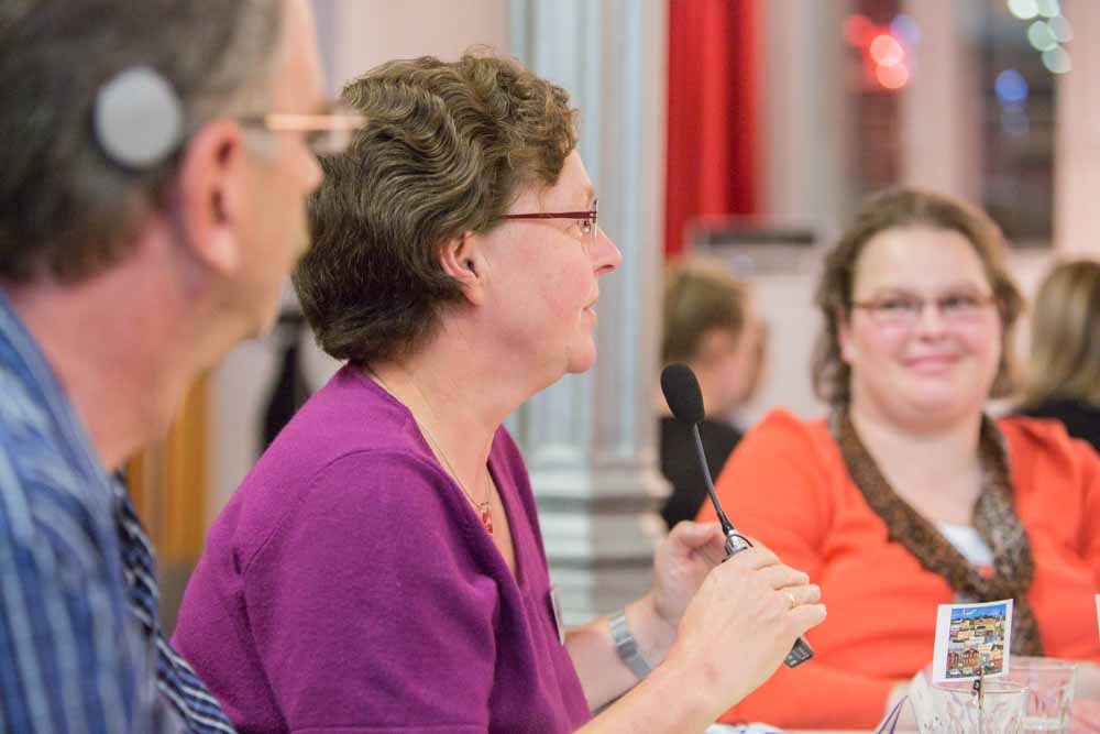 A participant speaks at the citizens' dialogue 