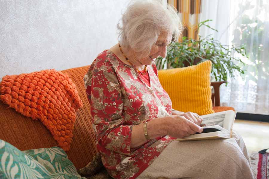 Old memories are important for Katharina Bittenbinder, who suffers from Alzheimer's. Here she is looking at an old photo album.