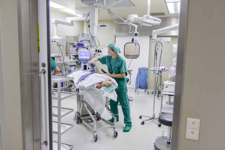 The patient is prepared for the eye operation, during which the lens of the eye is exchanged.